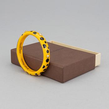 LOUIS VUITTON, Limited Edition Yayoi Kusama "Yellow Dots Infinity" Bangle PM Bracelet.