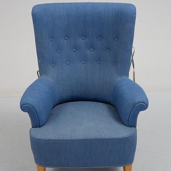 A mid 20th century armchair, possibly designed by Carl Malmsten.