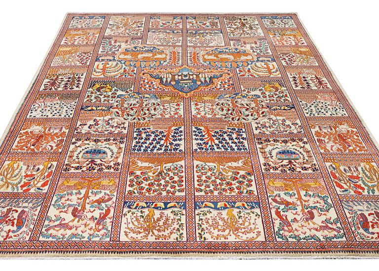 A Kashmar carpet, c. 391 x 291 cm.
