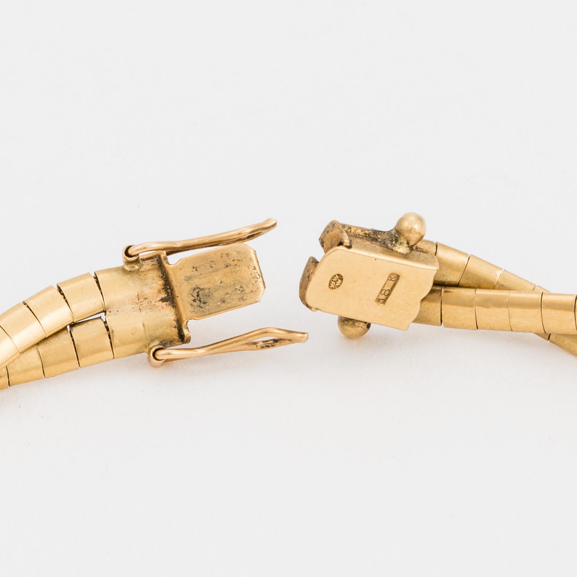 A two-rowed Omega link bracelet.