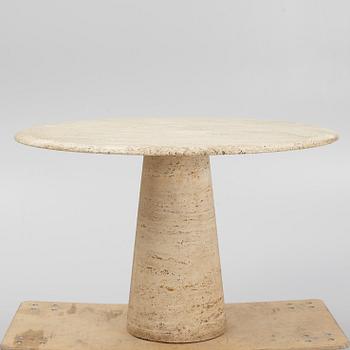 A travertine dining table, late 20th century.