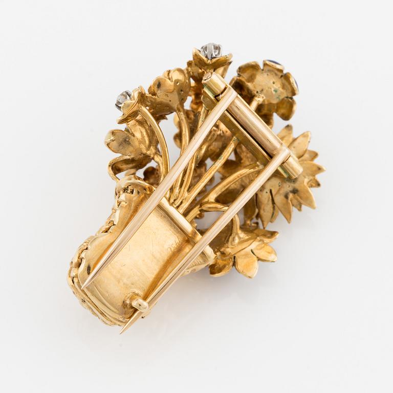 A basket brooch in 18K gold and enamel designed by Barbro Littmarck, W.A. Bolin Stockholm 1974.