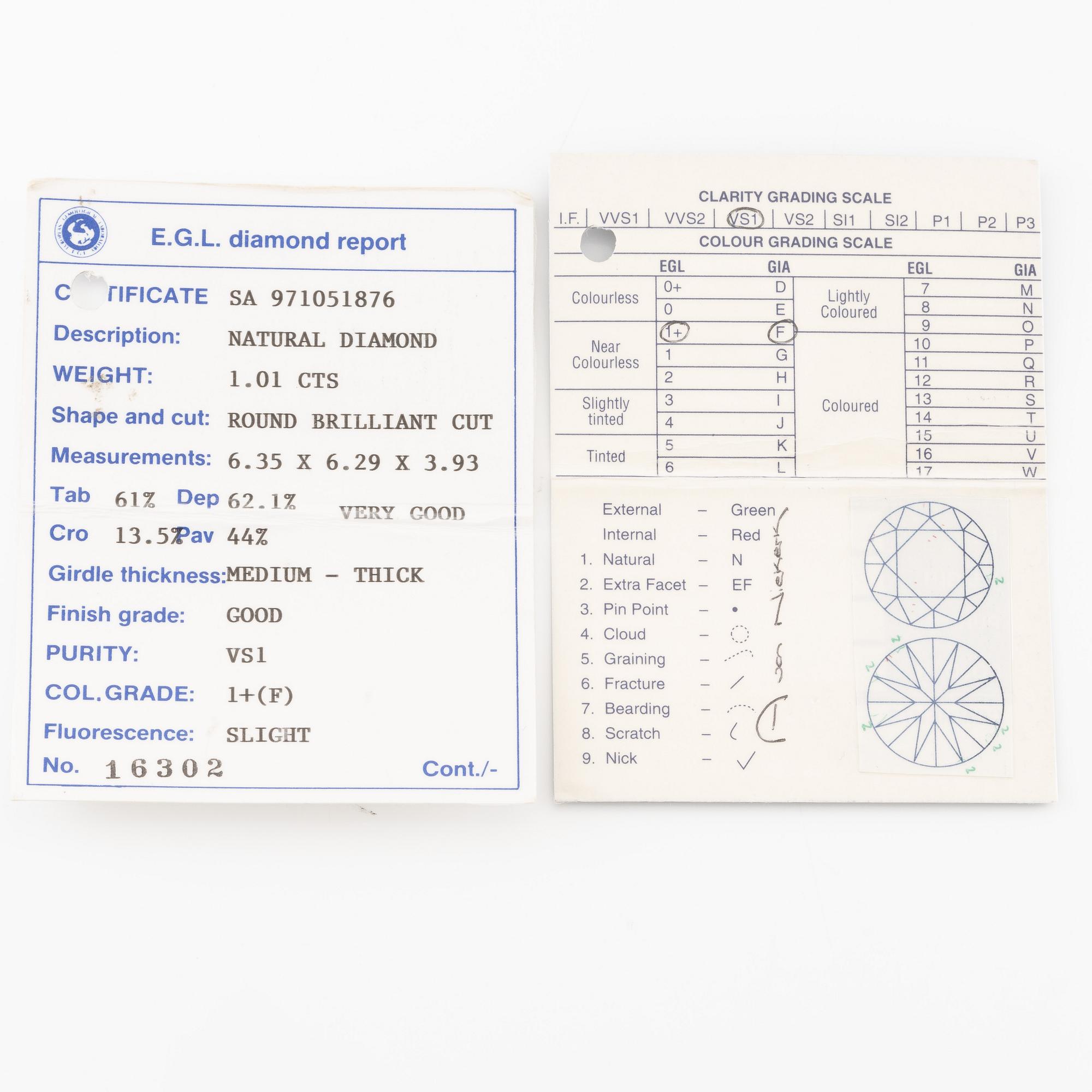 Ring 18K gold with a round brilliant-cut diamond.