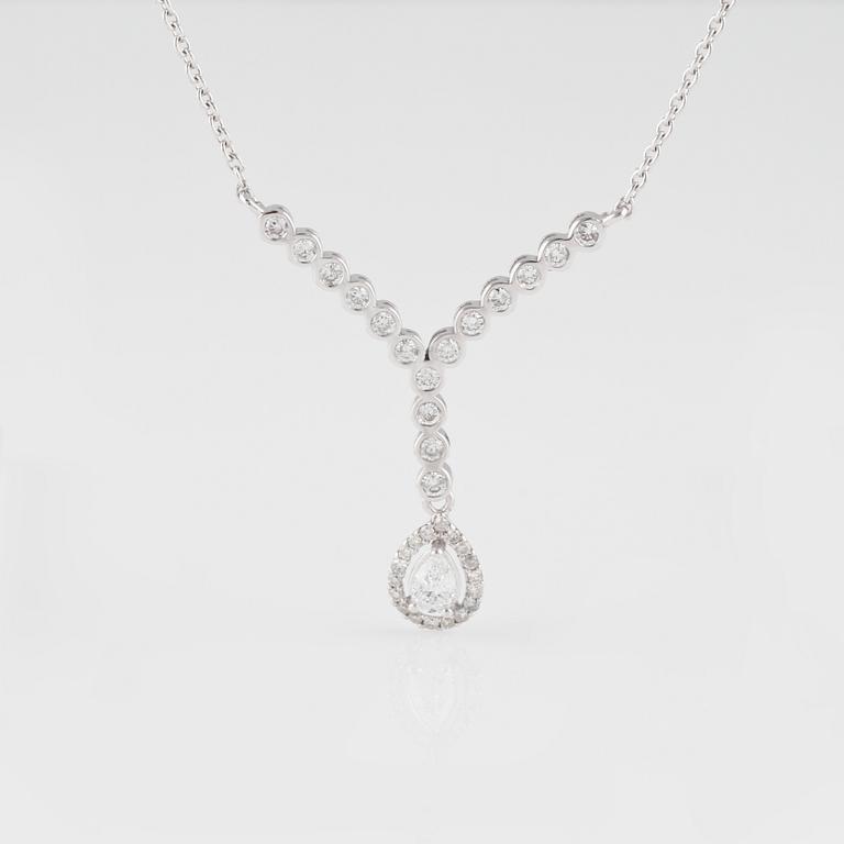 COLLIER, 18K vitguld med dropp- och briljantslipade diamanter ca 0.40 ct. Vikt 3,1 gram.