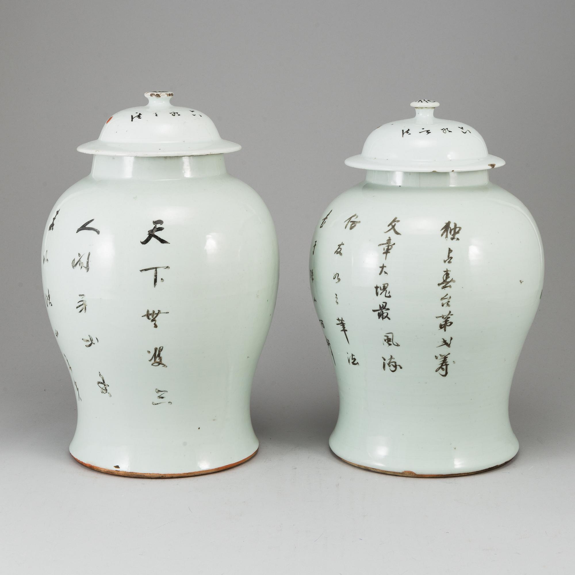 A pair of Chinese famille rose vases with covers, 20th century.