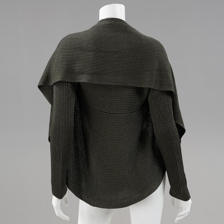 Two cardigans and a silkblouse by Ralph Lauren.
