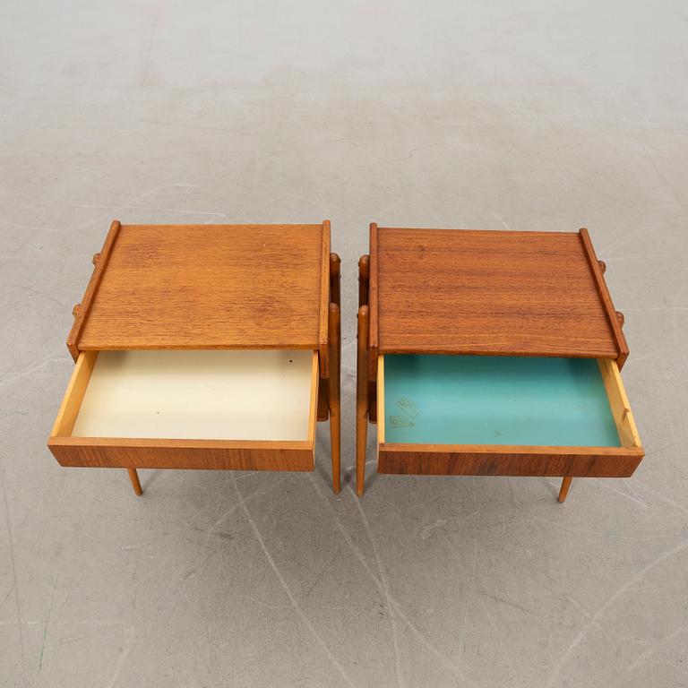 A pair of bedside tables, mid-20th century.