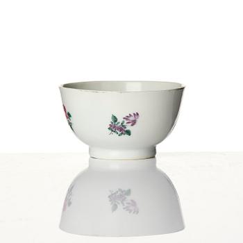 A famille rose armorial cup and stand with the monogram of the Swedish King Gustavus III, Qing dynasty, 18th century.