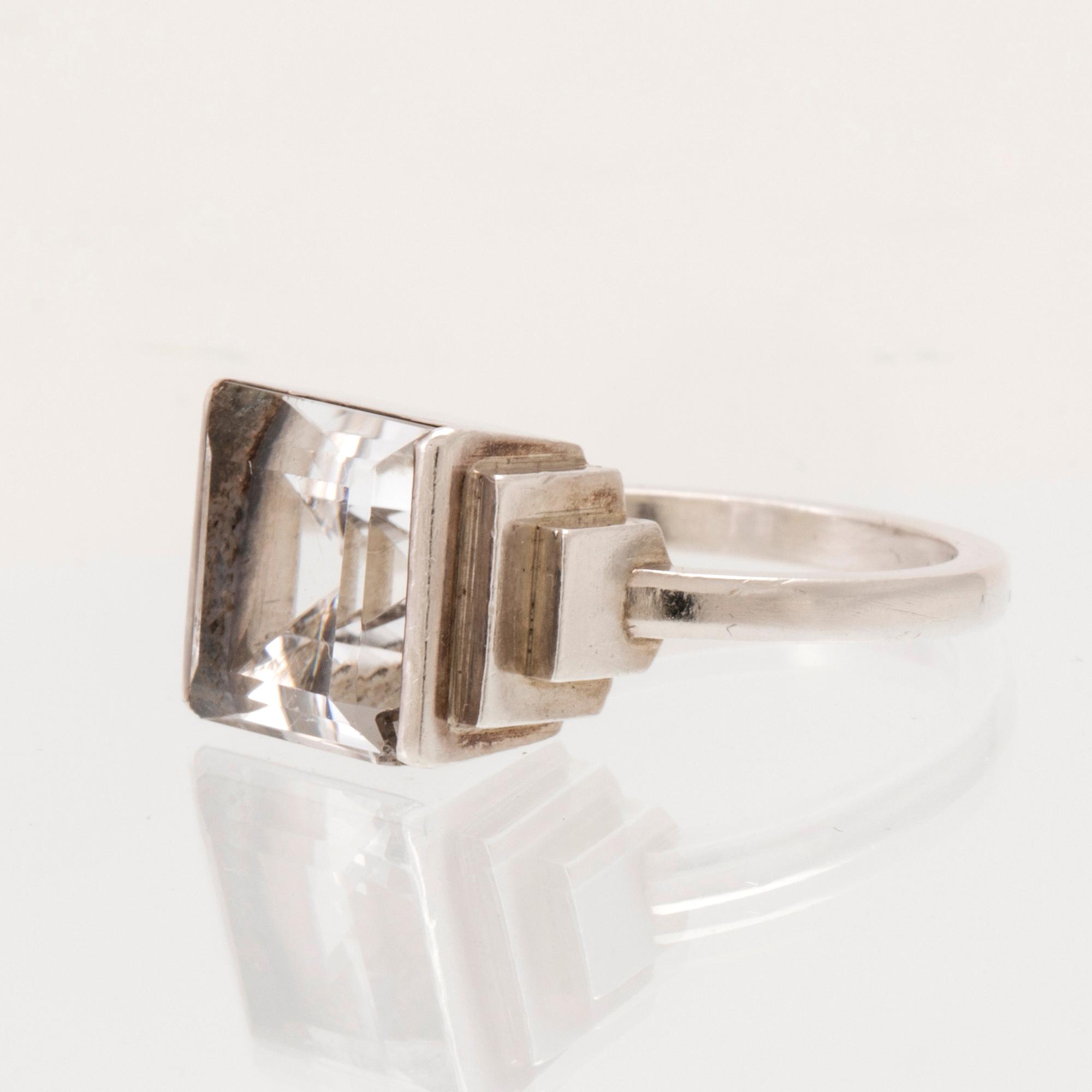 A silver ring set with a step-cut rock quartz crystal by Wiwen Nilsson Lund 1939.