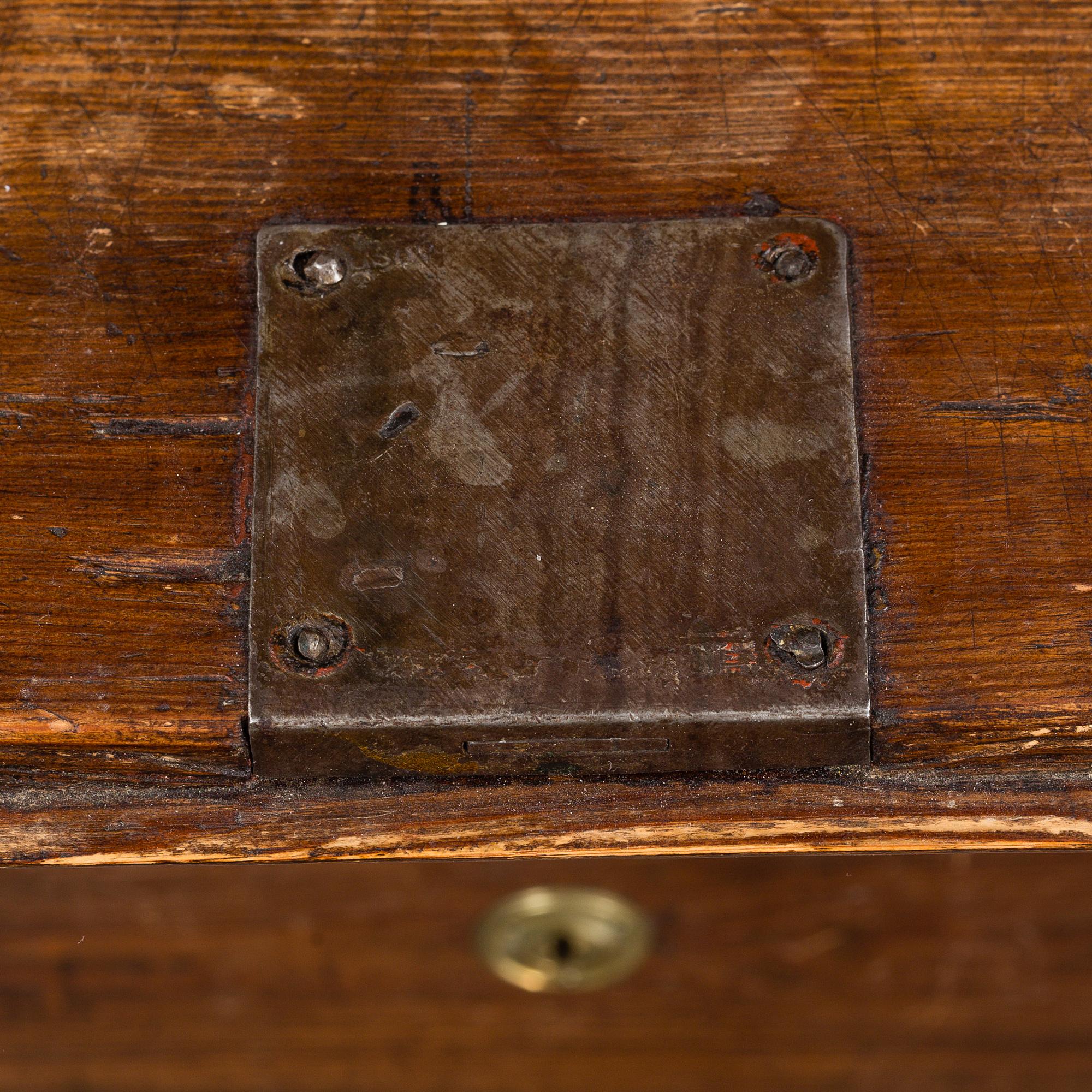 An early 19th Century pine cabinet.