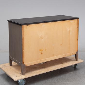 A painted chest of drawers, second half of the 20th Century.