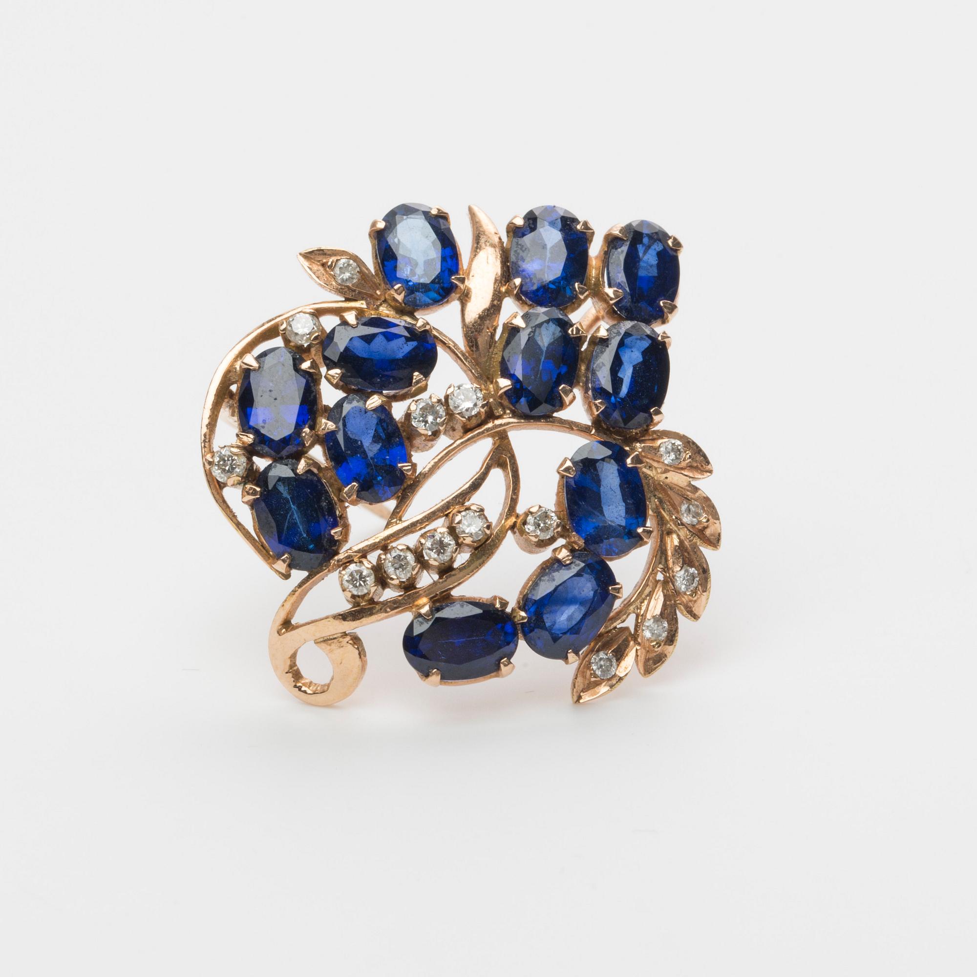 BROSCH/HÄNGE, 14K guld med safirer samt briljantslipade diamanter ca 0.20 ct.