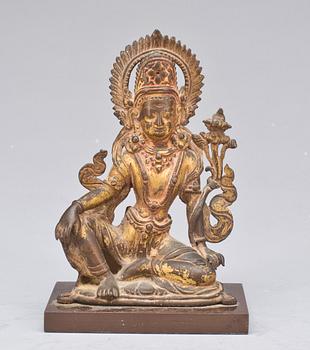 A gilt bronze figure of Indra, Nepal, 18th Century or older.