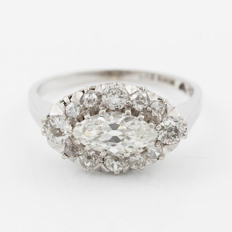 Ring in 18K white gold set with a marquise-cut diamond and old-cut diamonds.