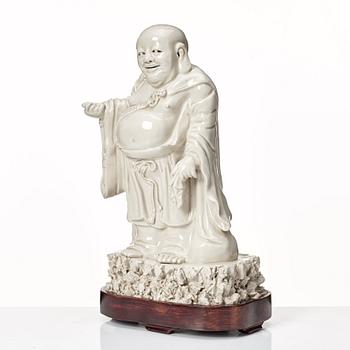 A blanc de chine figure of Buddai, Qing dynasty.