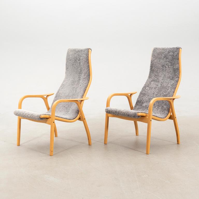 Yngve Ekström, a pair of "Lamino" armchairs for Swedese, late 20th century.