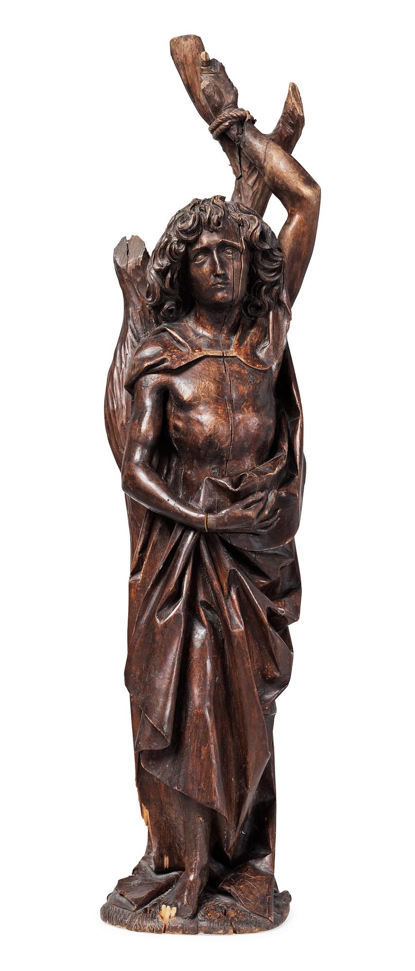 A wooden sculpture depicting St Sebastian, probably German, circa 1500.