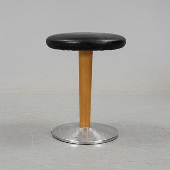 A mid 20th century stool with crome foot and leather coated seat.