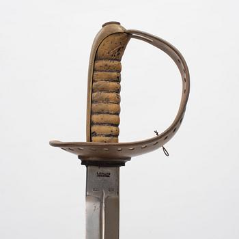 A Swedish cavalry saber with scabbard, 1893 pattern.