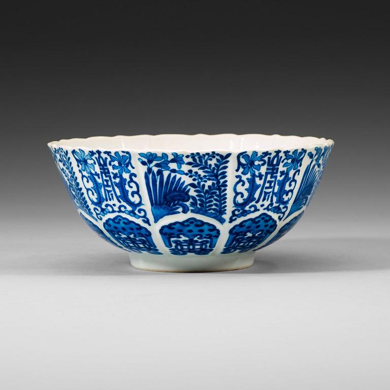 A blue and white lotus bowl, late Qing dynasty (1644-1912) with Jiaqing seal mark.