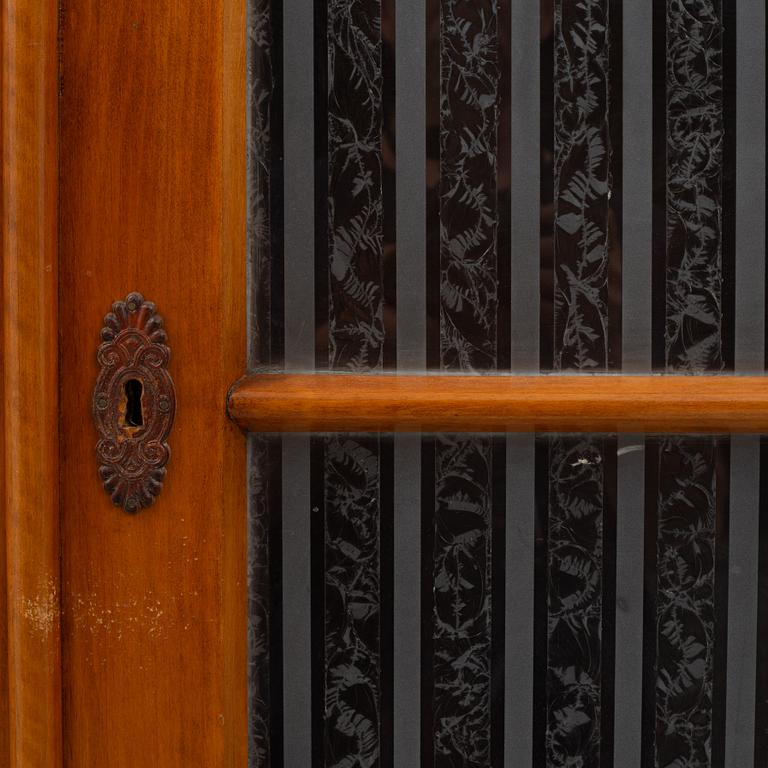 A bookcase, circa 1900.
