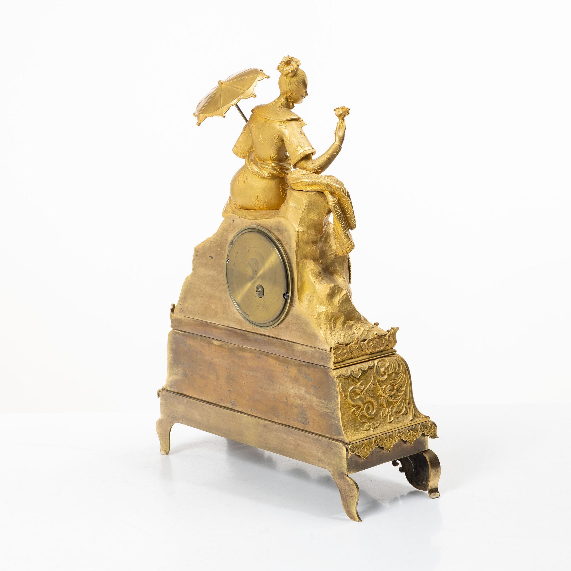 A Late Empire table clock, 19th century.