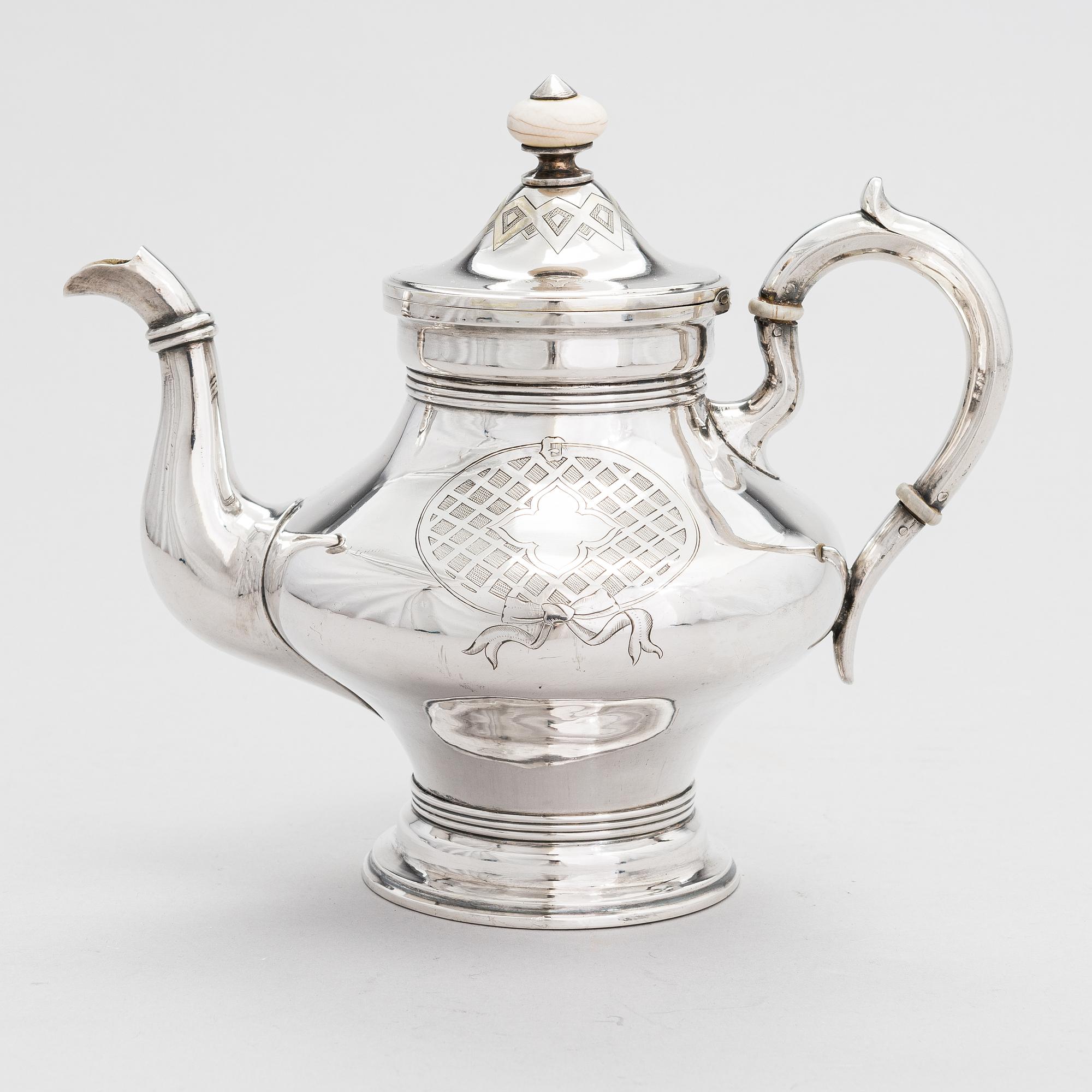 A Russian silver teapot, maker's mark of Andrei Wilgelmovich Wekman, Moscow 1871.