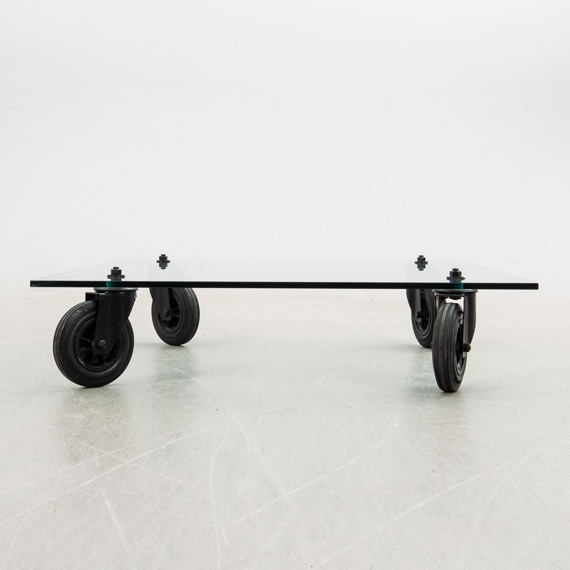 Gae Aulenti, coffee table, "Table with Wheels", Fontana Arte, Italy late 20th century/early 21st century.