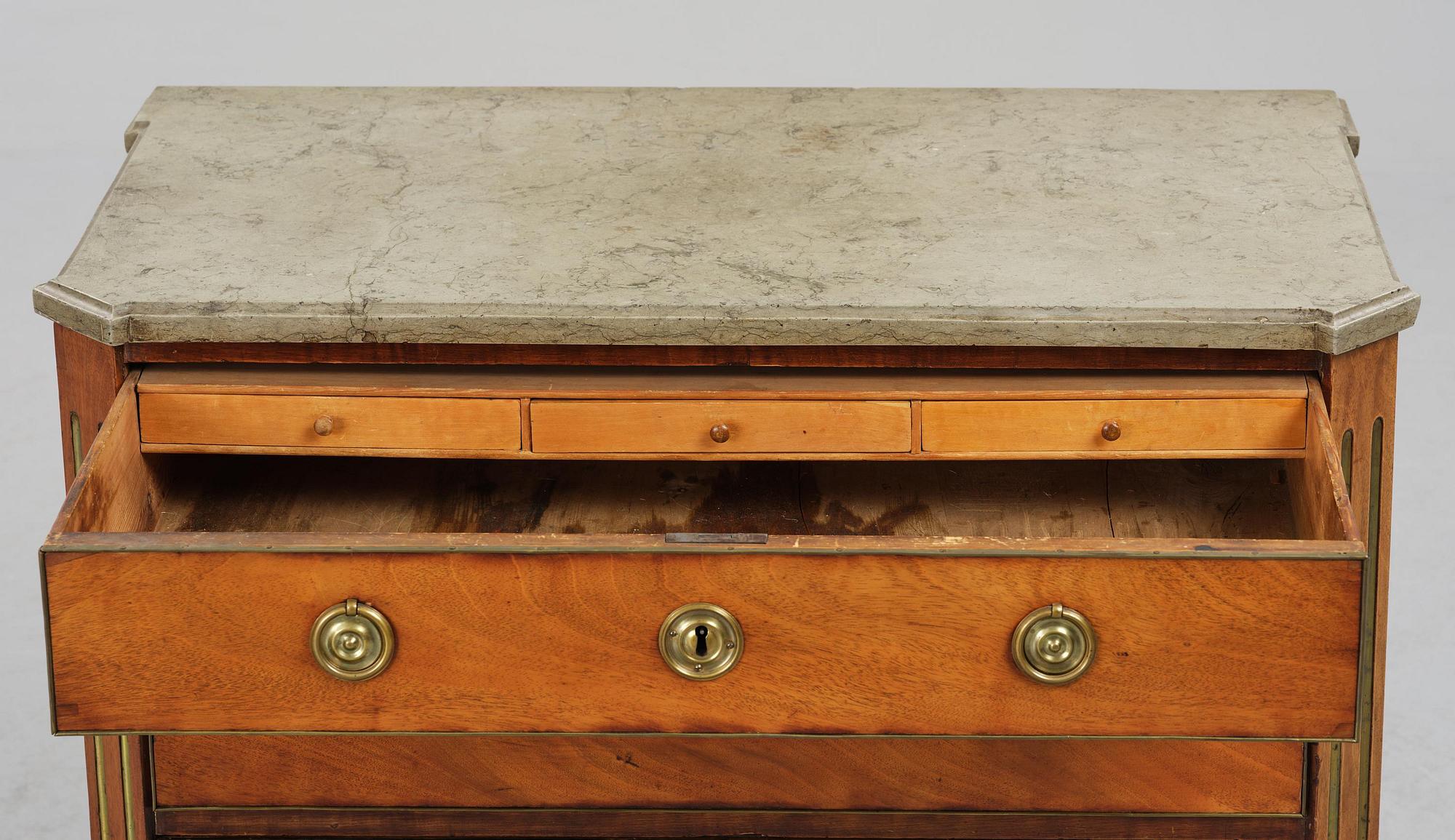 A late Gustavian mahogany commode by Erik Nyström (master in Stockholm 1773-88).