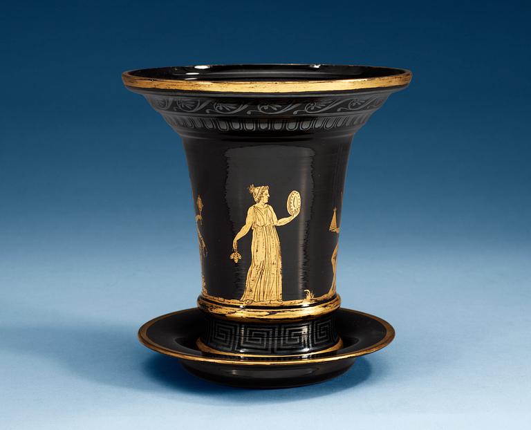 A Russian gilt black Etruscan style glass cache-pot with stand, circa 1800.
