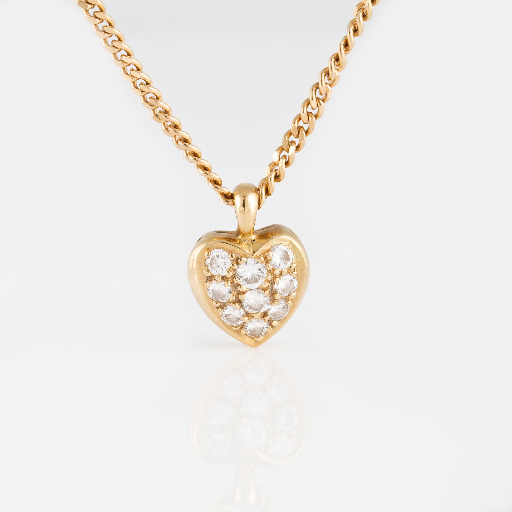 HÄNGE, 18K guld med briljantslipade diamanter. Vikt 9,5 gram.