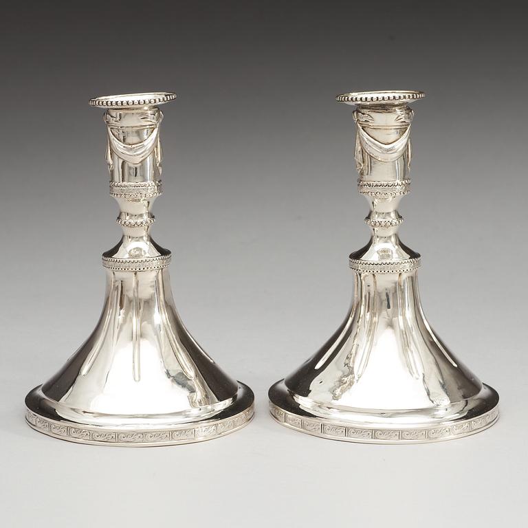 A Swedish pair of 18th century silver candlesticks, makers mark of Johan Bergengren, Kristianstad 1780.