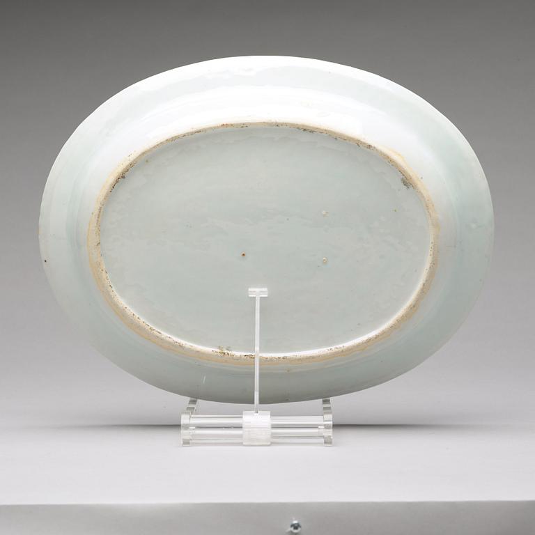 A famille rose 'double peacock' serving dish, Qing dynasty, Qianlong (1736-95).