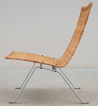 A Poul Kjaerholm steel and ratten 'PK-22' easy chair, E Kold Christensen, maker's mark in the steel.