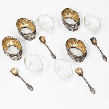 Four French silver salt cellars with spoons, mark of Oilier & Caron,  Paris, 1910-1936.