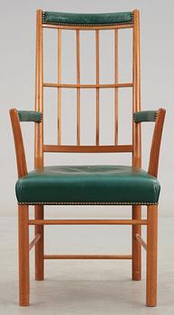 A Josef Frank mahogany and green leather armchair, Svenskt Tenn, model 652.