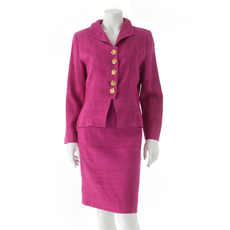 YVES SAINT LAURENT, a two-piece polka dotted blue cotton blend dress consisting of jacket and skirt.