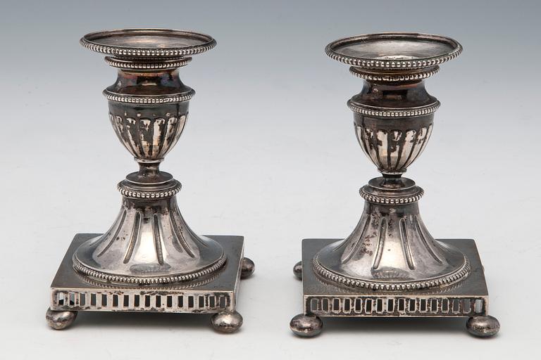 A PAIR OF CANDLESTICKS.