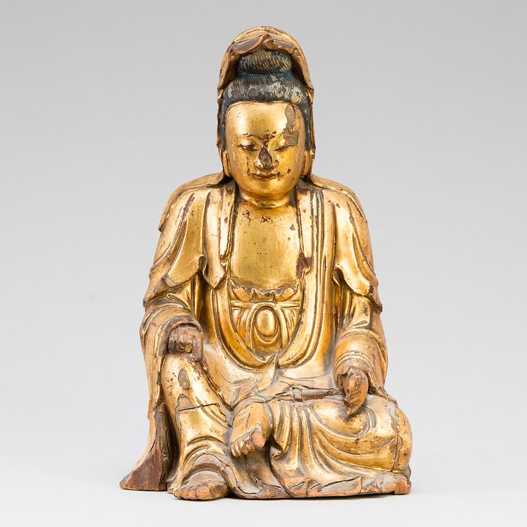 A Chinese giltwood figure of Buddha, 17th-18th century.