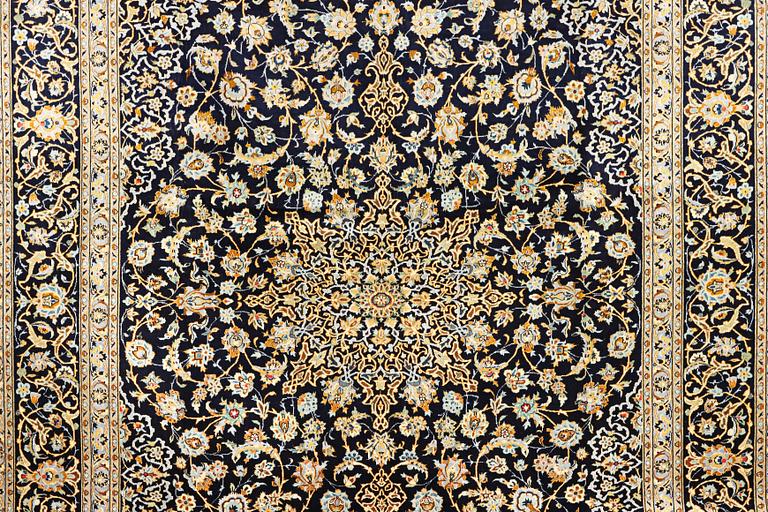 A Keshan carpet, c. 422 x 306 cm.
