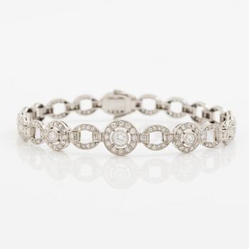 Bracelet in platinum set with round brilliant, octagonal, and rose-cut diamonds.