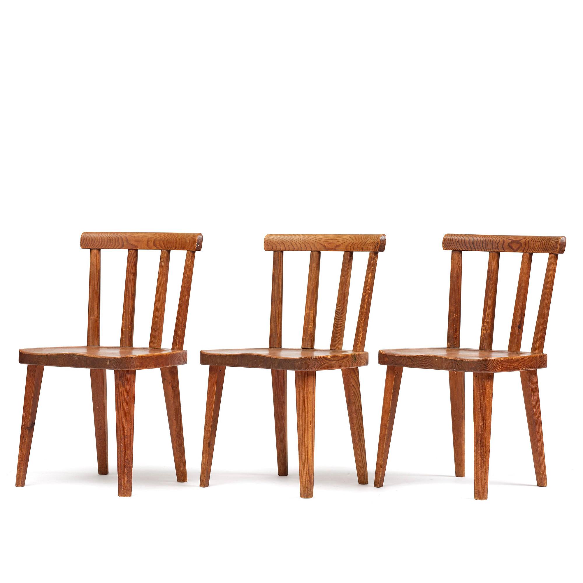 Axel Einar Hjorth, a set of three stained pine "Utö" chairs, Nordiska Kompaniet, Sweden, 1930s.