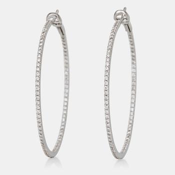 677. A pair of brilliant-cut diamond hoop earrings. Total carat weight circa 1.80 cts.