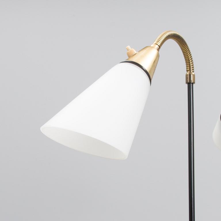 A mid 20th century floor lamp, marked AJH.7.