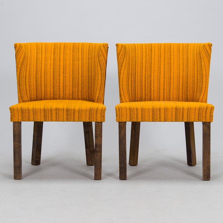 A Finnish 1930s dining table and eight chairs.