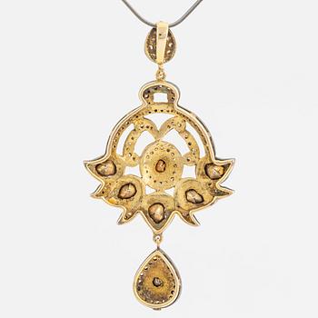 A faceted diamond necklace.