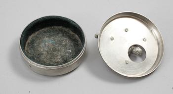 MANSCHETTKNAPPSASK, tenn, "Originell", Widerholm & Dahlberg, Eskilstuna, 1930/40-tal.