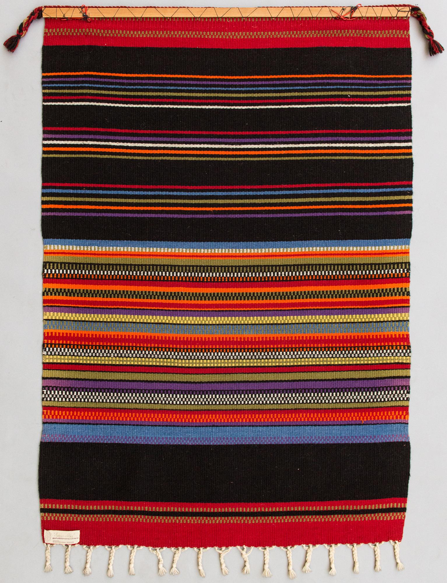 Elsa Montell-Saanio, A Raanu "Maddar Ahku" textile from Lapland designed by Elsa Montell-Saanio. Circa 132x90 cm.