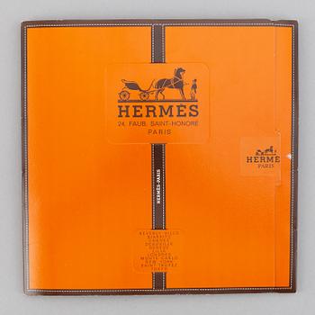 Hermès, a 'Qalamdan' silk scarf.