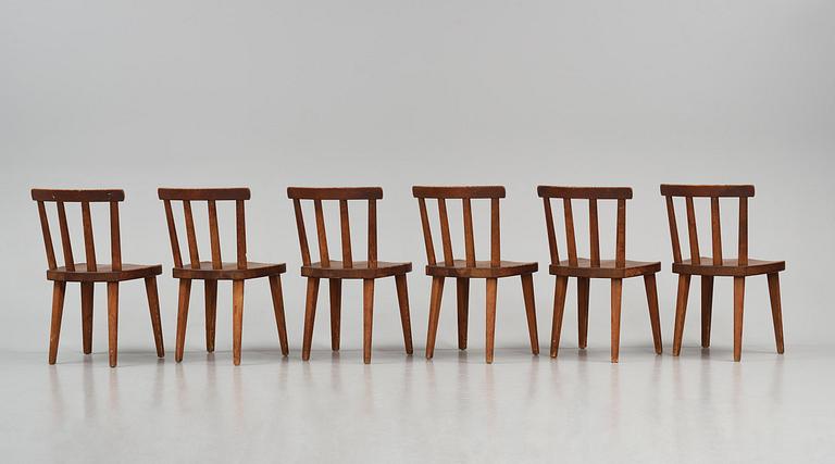 Axel Einar Hjorth, a set of six stained pine "Utö" chairs, Nordiska Kompaniet, Sweden, 1930s.
